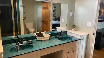 Combined shower/tub, hair dryer, towels, soap