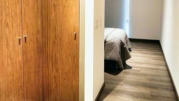 1 bedroom, desk, iron/ironing board, travel crib