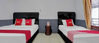 OYO 90405 Penginapan Sasti Kuningan