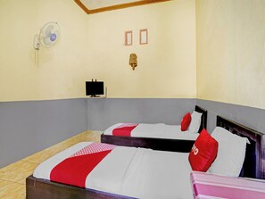Room - OYO 90405 Penginapan Sasti Kuningan (Cilimus)