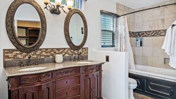 Combined shower/bathtub, jetted bath, hair dryer, towels