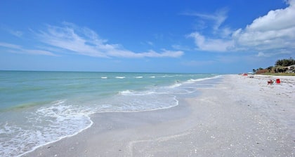 Pristine Residence with Direct Gulf Views at the Renowned Island Beach Club