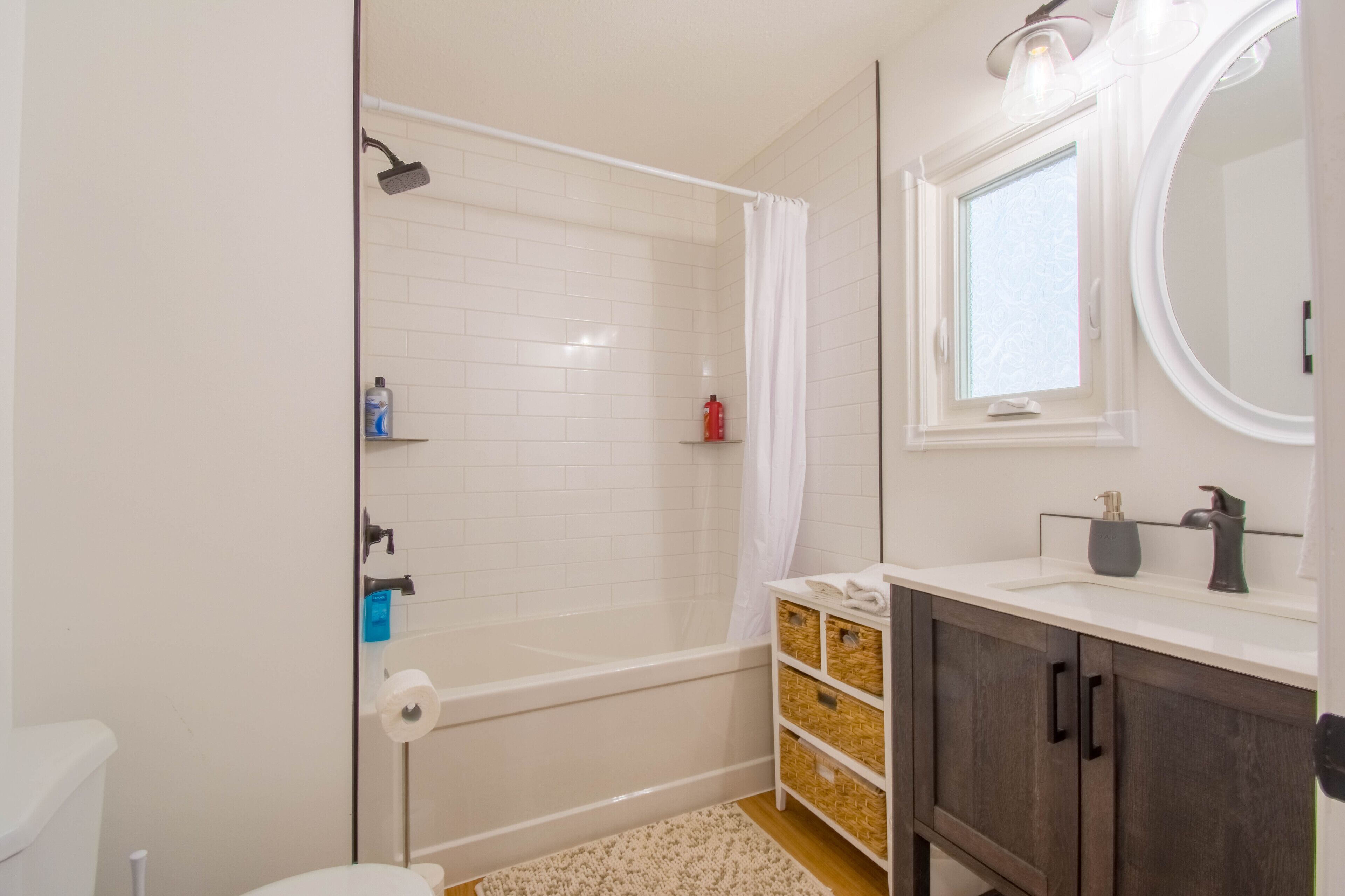 Combined shower/tub, hair dryer, towels, soap