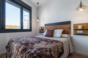 1 slaapkamer, een strijkplank/strijkijzer, gratis wifi, beddengoed