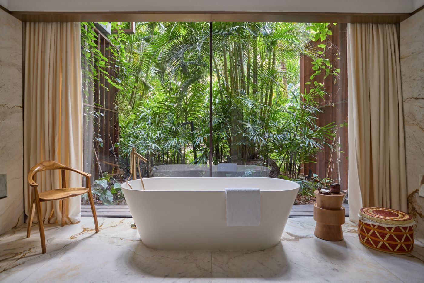 suite, multiple beds | bathroom | free toiletries, hair dryer, bathrobes, slippers