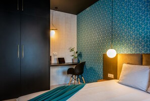 Apartamento Deluxe | 1 dormitorio, decoración individual, mobiliario individual y escritorio