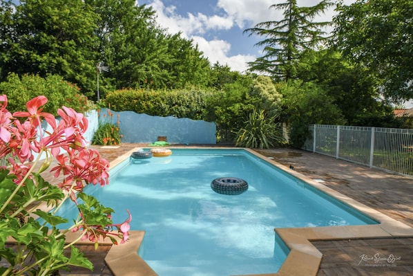 Seasonal outdoor pool, a heated pool