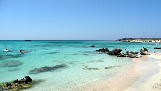 A beach with clear turquoise water, rocky outcrops, and a sandy shore. - ★ Only for 2 ★ cosy stone villa, totally private, pool, near sea, WiFi, parking (Chania)