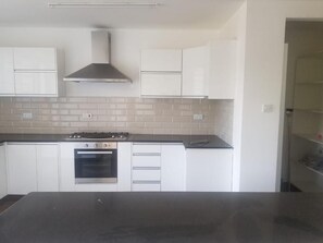 Private kitchen - Condo located in lush residential area of Riverside with beautiful view. (Nairobi)