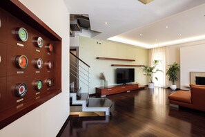 Smart TV, foosball, table tennis, books