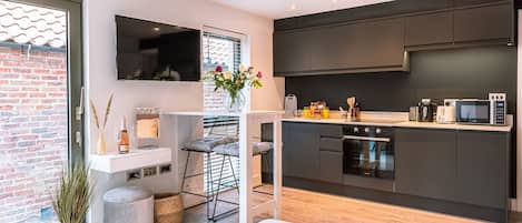 1 غرفة نوم ومكواة/لوح كي وخدمة الإنترنت