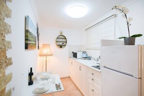 Fridge, microwave, toaster, cookware/dishes/utensils