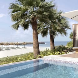 Outdoor pool, open 8:00 AM to 7:00 PM, pool loungers