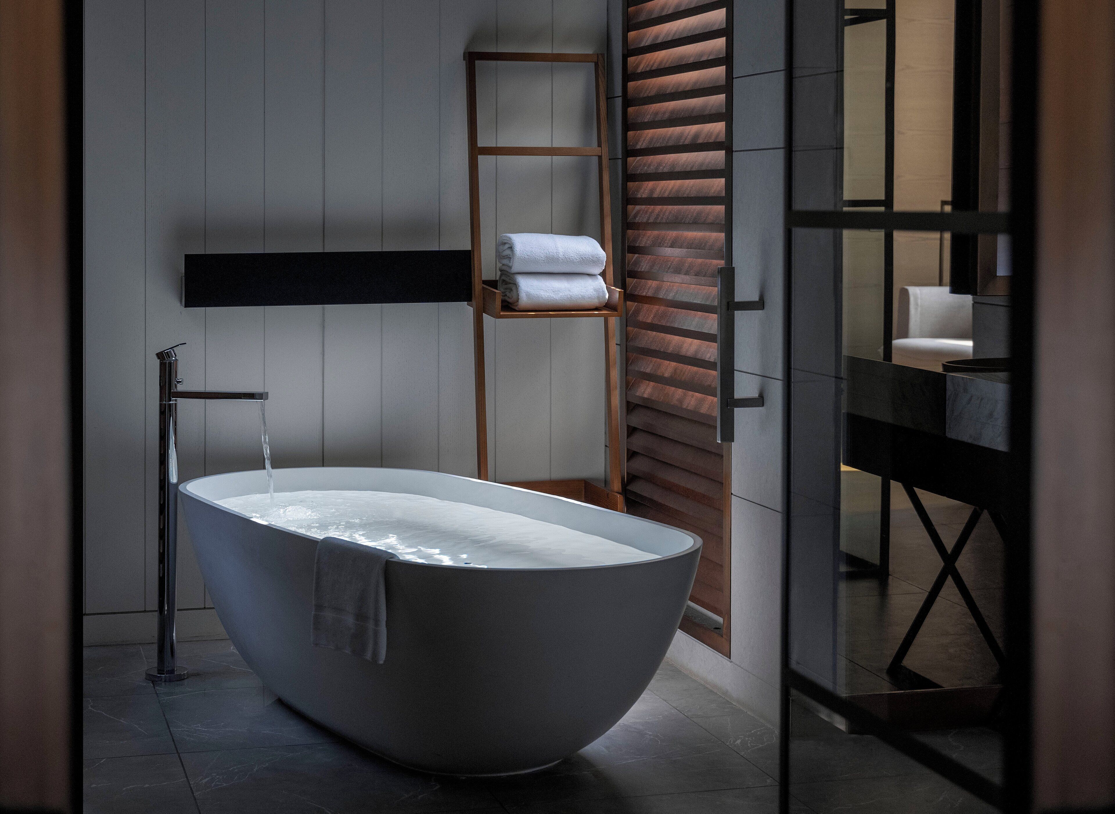 Premium bedding, down comforters, Select Comfort beds, minibar