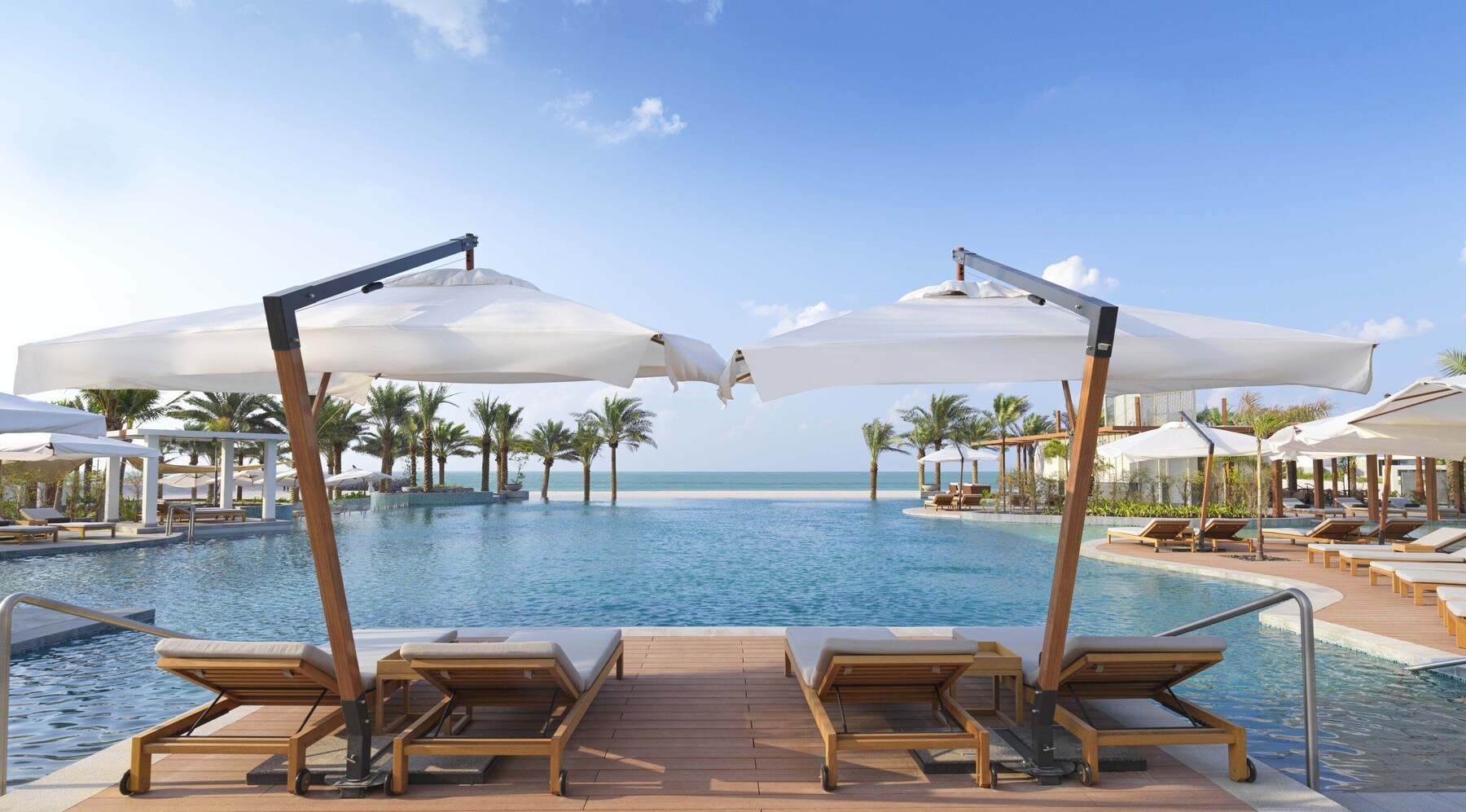 Outdoor pool, open 8:00 AM to 7:00 PM, pool loungers