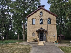 Exterior - Restored school house turned creative flex space (Perham)