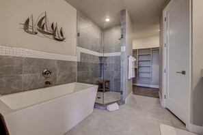 Combined shower/tub, hair dryer, towels, soap