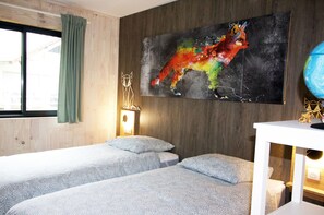2 habitaciones, tabla de planchar con plancha, cuna de viaje y wifi 