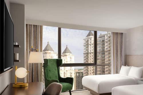 Premium bedding, down comforters, in-room safe, desk