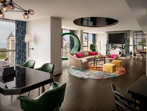 Piedmont Suite | Living area | 55-inch flat-screen TV with cable channels, TV, pay movies