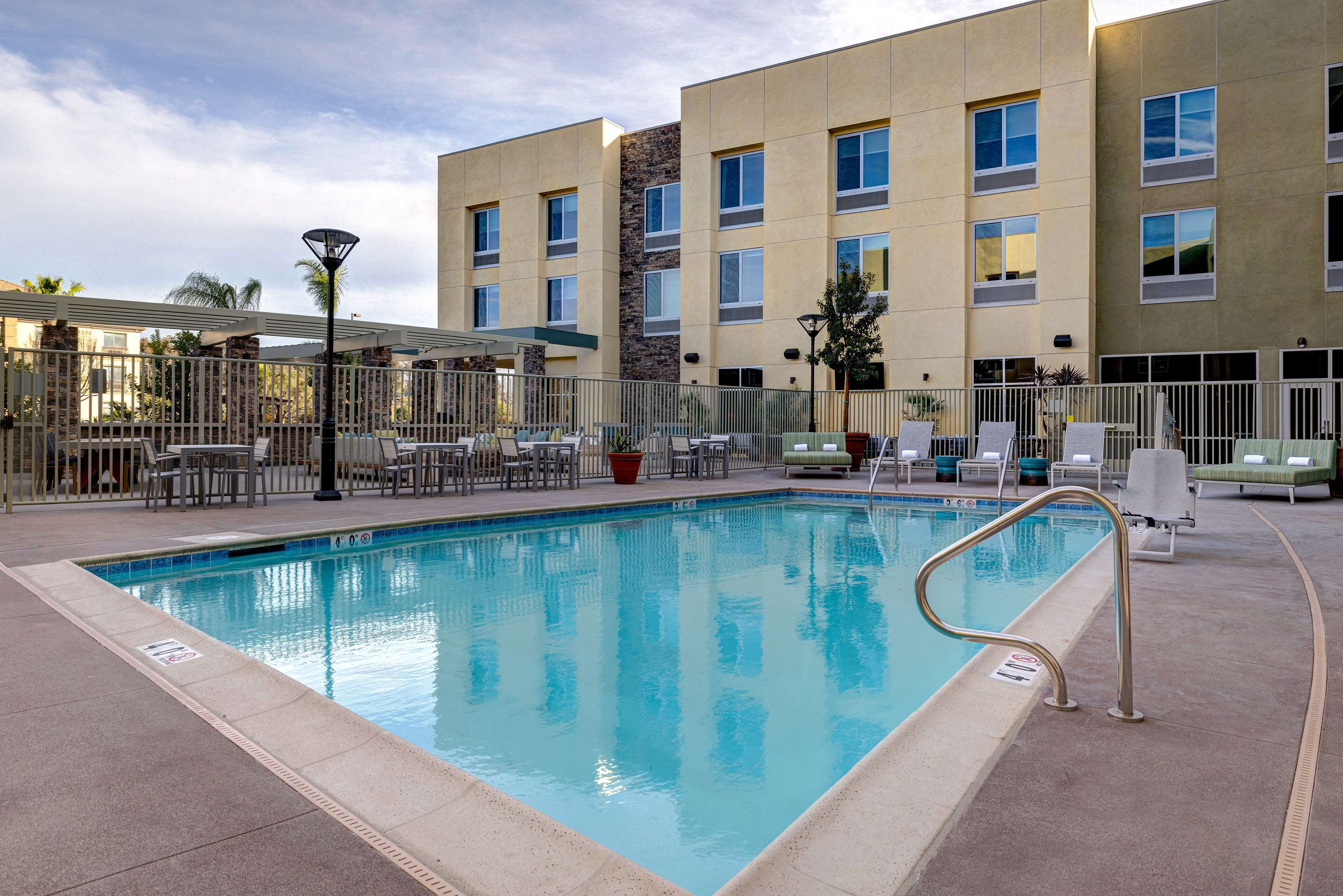 Outdoor pool, open 7:00 AM to 10:00 PM, sun loungers