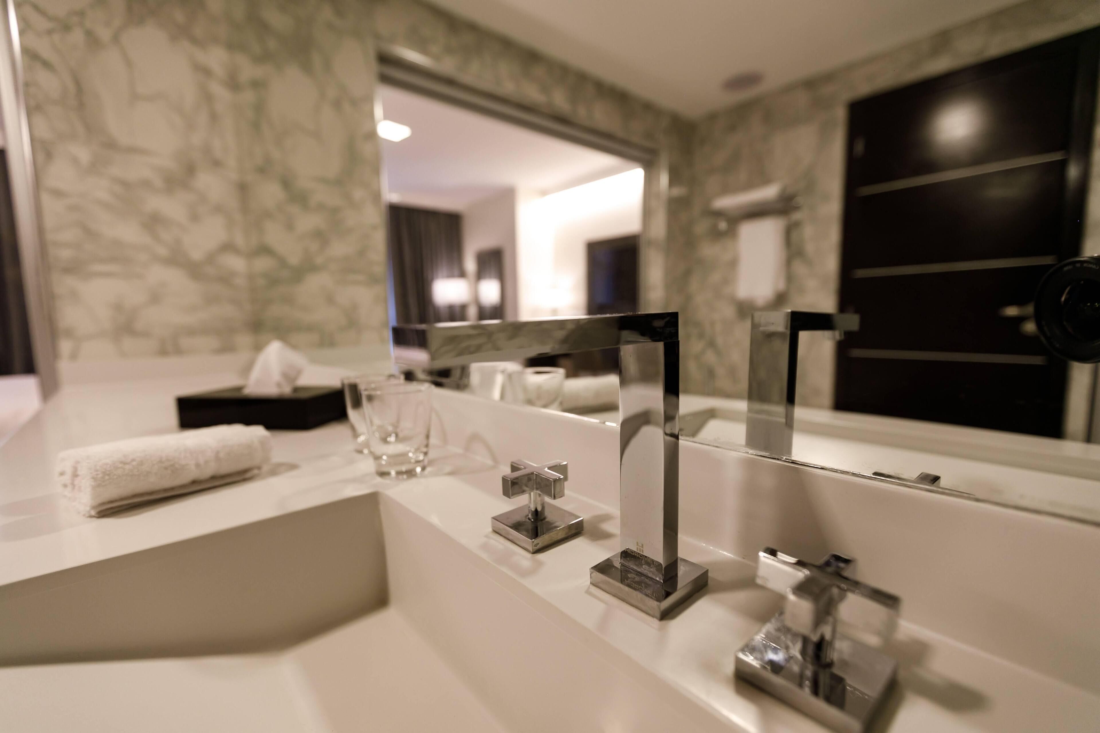 separate bathtub and shower, jetted bath, rainfall showerhead