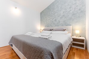 2 dormitorios, tabla de planchar con plancha, wifi gratis y ropa de cama