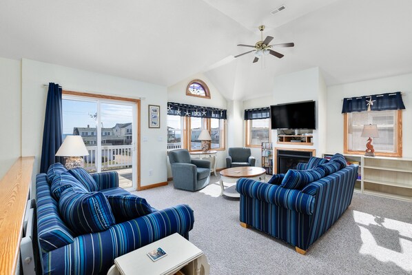 Flat-screen TV, video-game console, DVD player, foosball