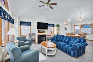 Flat-screen TV, video-game console, DVD player, foosball