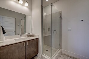 Bathtub, hair dryer, towels, soap