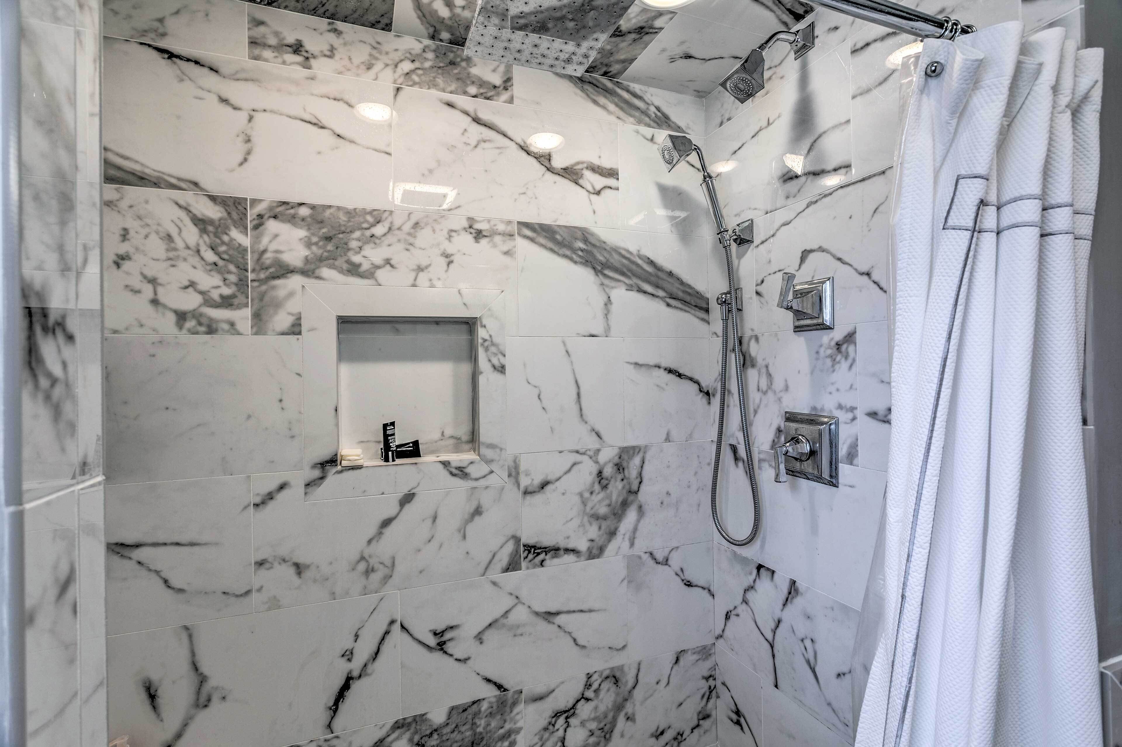 Rainfall showerhead, hair dryer, towels