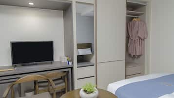 Down duvets, desk, laptop workspace, blackout curtains