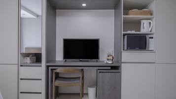 Down comforters, desk, laptop workspace, blackout drapes