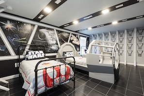 7 bedrooms, blackout drapes, iron/ironing board, travel crib
