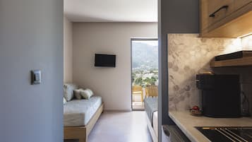 Superior studio, uitzicht op zee | Geluiddichte muren, gratis babybedden, gratis wifi, beddengoed