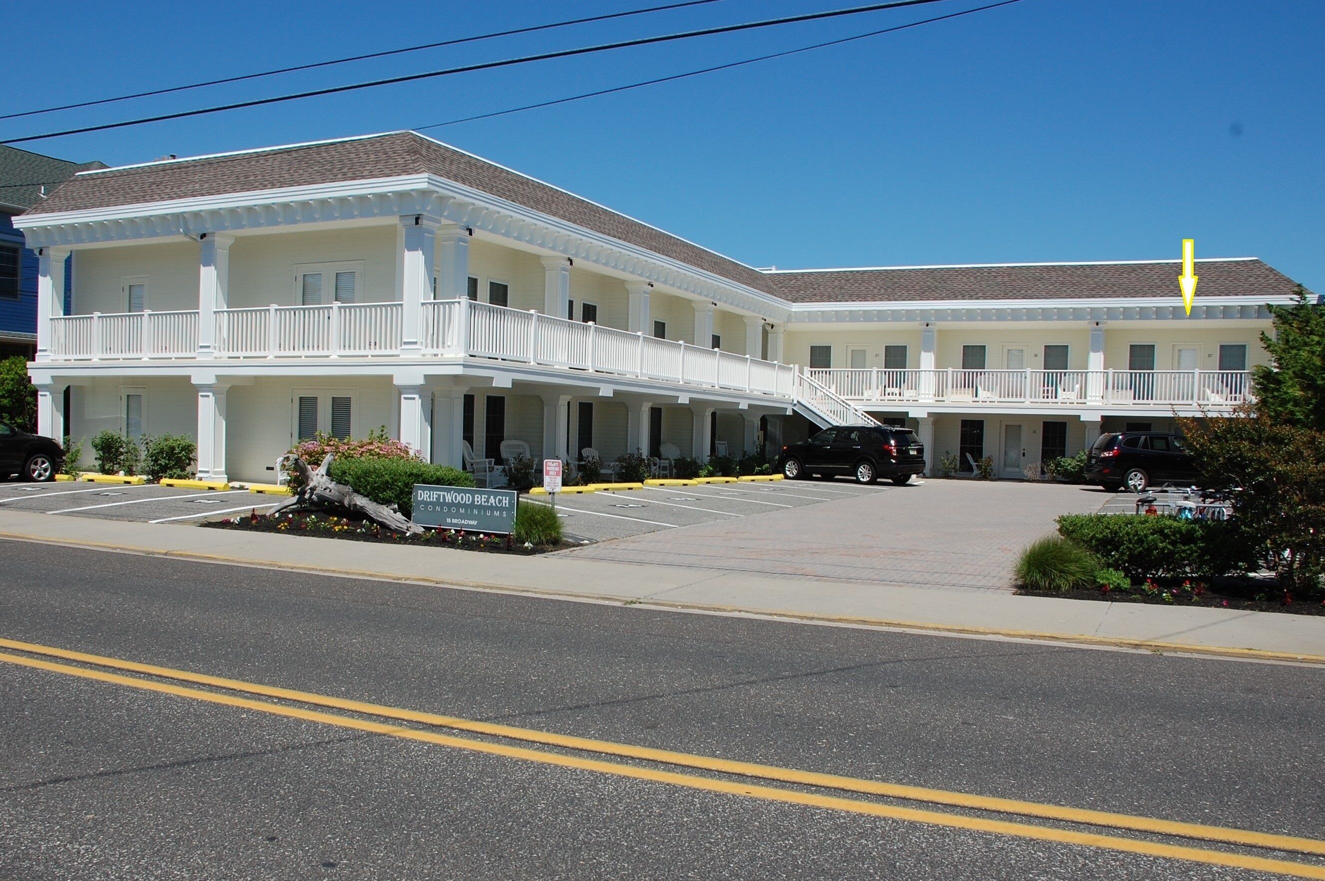 Modern and up-to date second-floor BEACH BLOCK END UNIT!