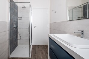 Shower, bidet, towels, soap