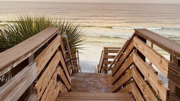 A wooden staircase leading to a beach with ocean views. - 30A condo. Private beach. Incredible view! (Seacrest)