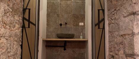 Shower, towels, soap, toilet paper