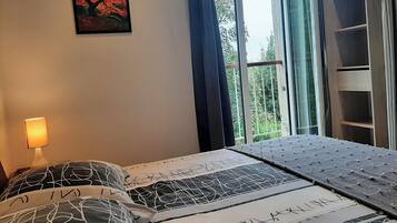 2 chambres, fer et planche Ă repasser, Wi-Fi gratuit, draps fournis