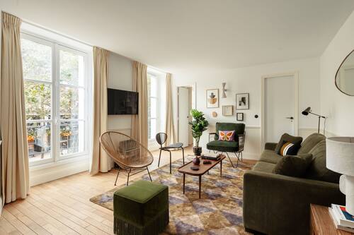 2-BR Deluxe Apartment with View | Living area | Flat-screen TV, printers