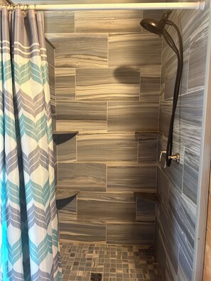 Shower, towels, toilet paper