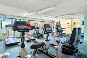 A gym with treadmills, stationary bikes, and elliptical machines. - 4-bedroom, 3-bathroom oceanfront condo with spacious private balcony - | Ocean Bay Club - 402 (North Myrtle Beach)