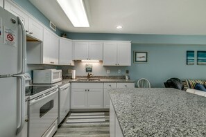 Fridge, microwave, oven, stovetop - Renovated 1-bedroom, 1-bath 3rd floor oceanfront condo | Ocean Inn - 303 (North Myrtle Beach)