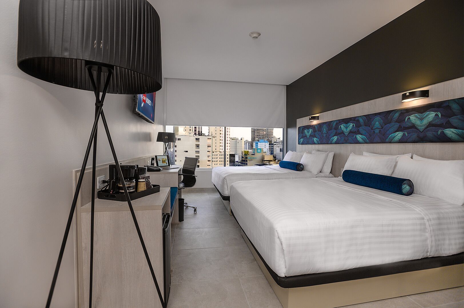 double room, 2 queen beds, city view | premium bedding, minibar, in-room safe, desk