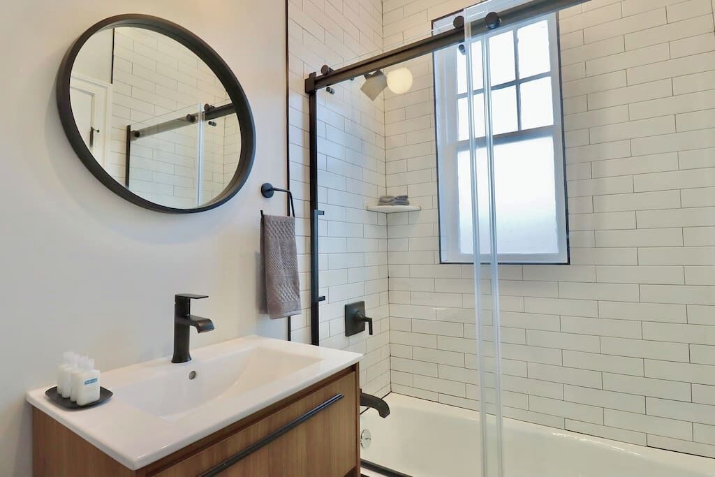 Bathtub, hair dryer, towels