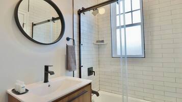 Bathtub, hair dryer, towels