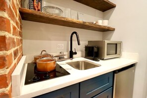 Fridge, microwave, stovetop, coffee/tea maker