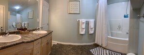 Combined shower/bathtub, hair dryer, towels, soap