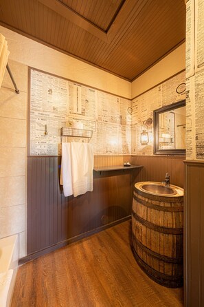 Bathtub, hair dryer, towels